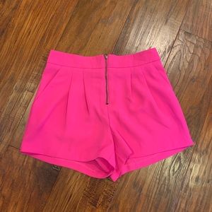 Pink high waisted zip pleated shorts